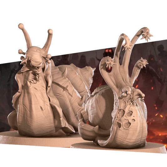 two large, detailed sculptures of snails with intricate designs and features.