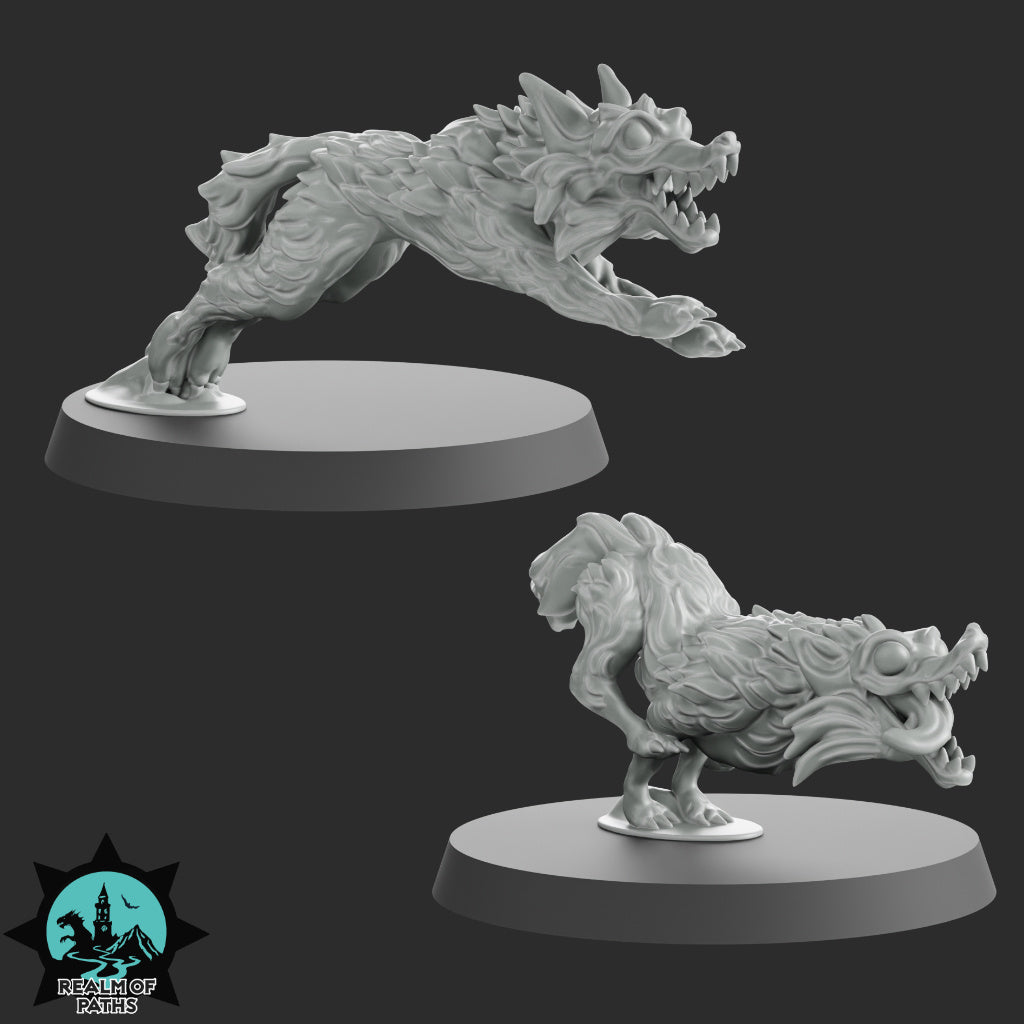 two 3D models of fantastical creatures, including a large, fierce-looking creature with sharp teeth and claws, and a smaller, more intricate creature with a unique design.
