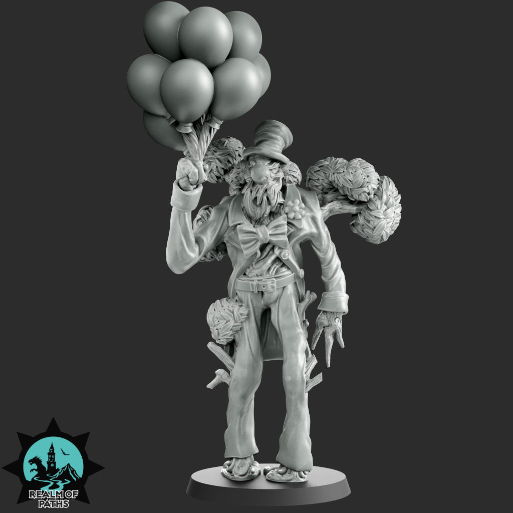 A statue of a clown holding a bunch of balloons.