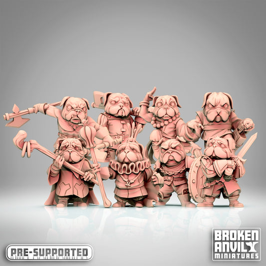 a group of small toy figurines are posed together